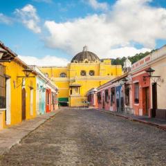 shutterstock_579290590 La Merced church and colonial houses in tha street view of Antigua.jpg